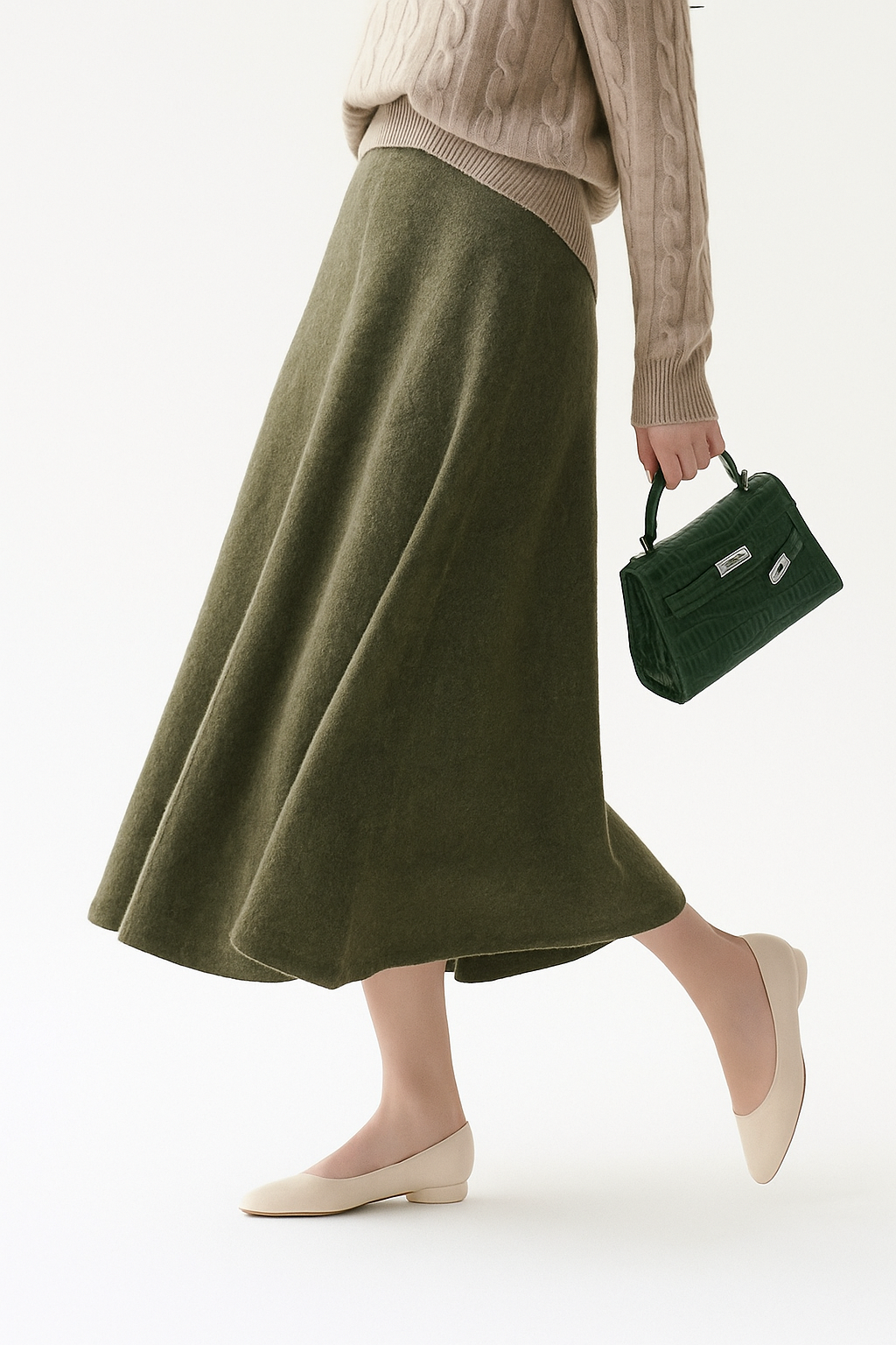 Elegant olive merino wool knit maxi skirt for women, high-waisted and flowing, perfect for winter fashion.