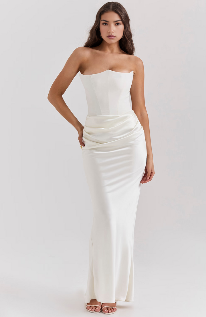 Back view of a graceful strapless corset maxi dress, perfect for formal evening gatherings.