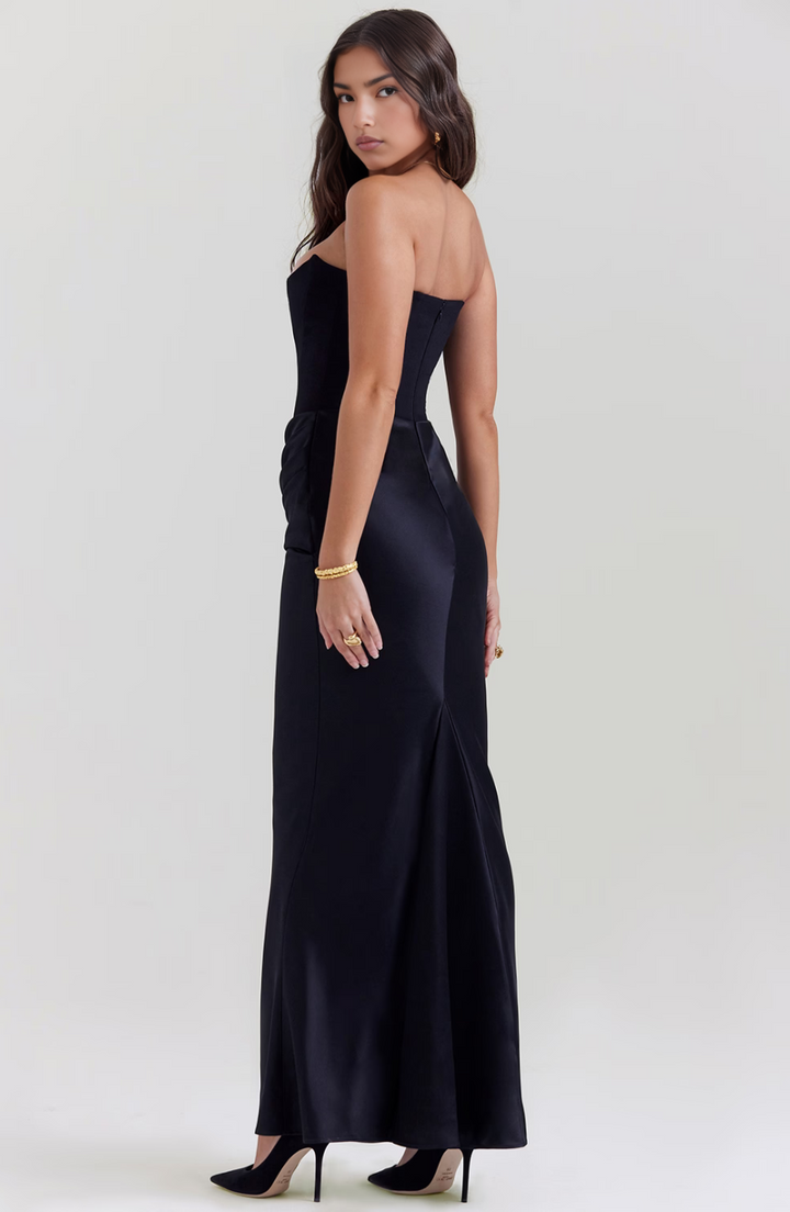 A sophisticated strapless corset maxi dress, ensuring a memorable presence at any formal event.