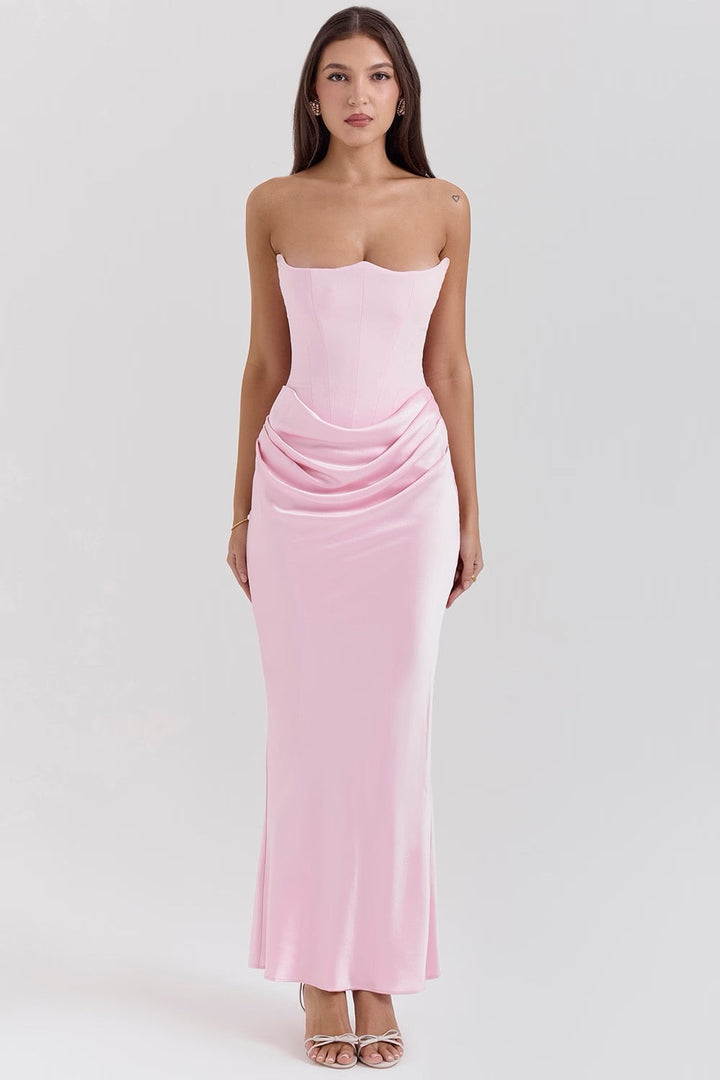 Chic strapless maxi wedding guest dress with a structured corset bodice, full length.