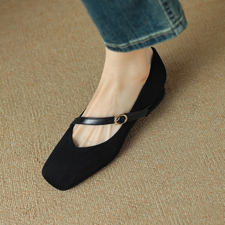 Back view of women's black suede block heel pumps, highlighting the sturdy and comfortable heel.