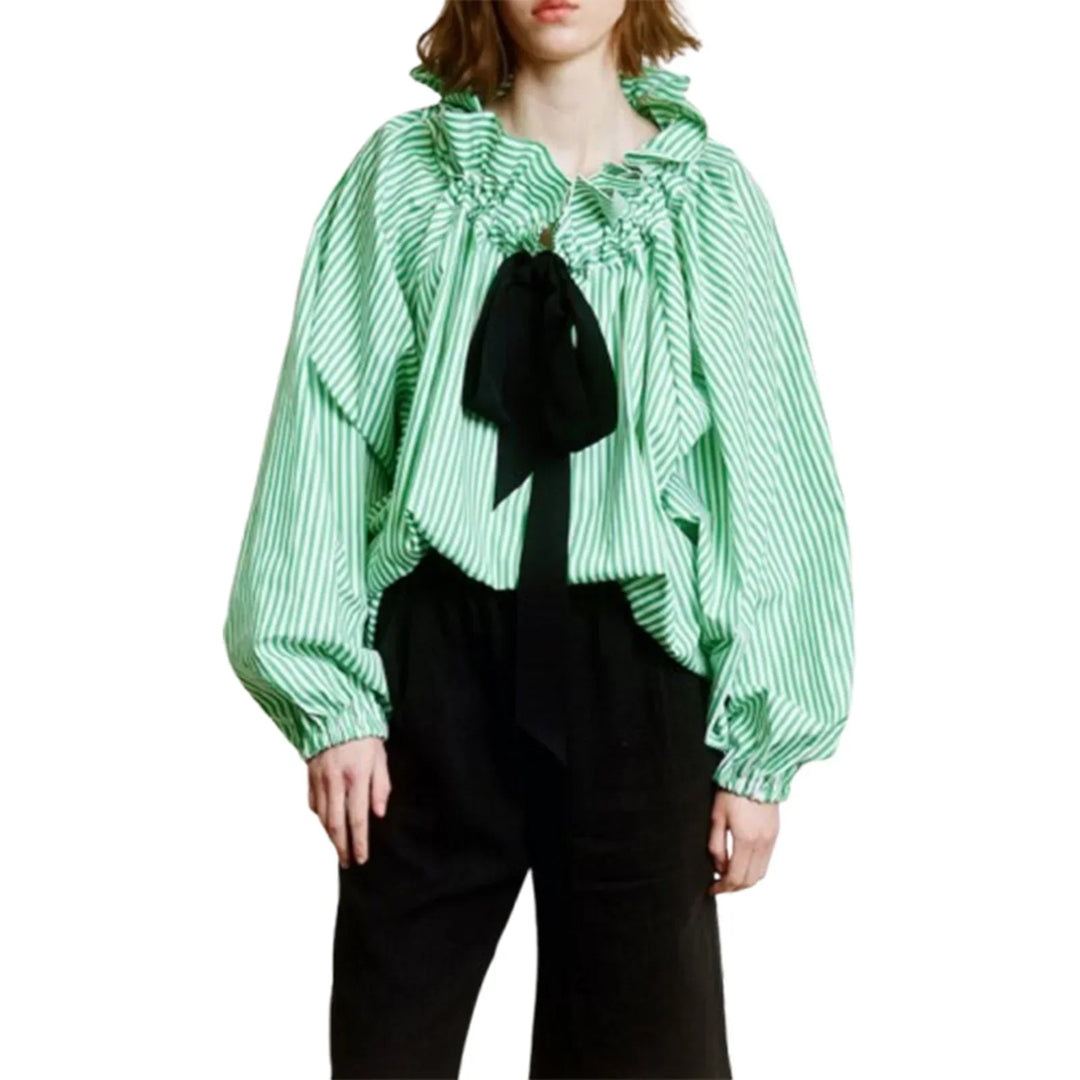 White women's blouse for elegant occasions, designed with ruffled neck, bow tie, and puffed lantern sleeves.