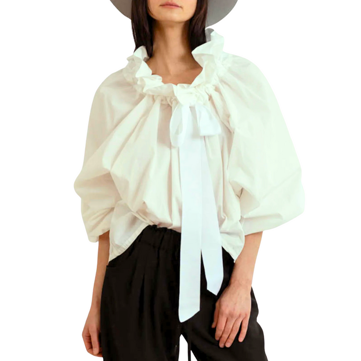 High-fashion women's white blouse, showcasing elegant puffed lantern sleeves and a chic ruffled neckline.