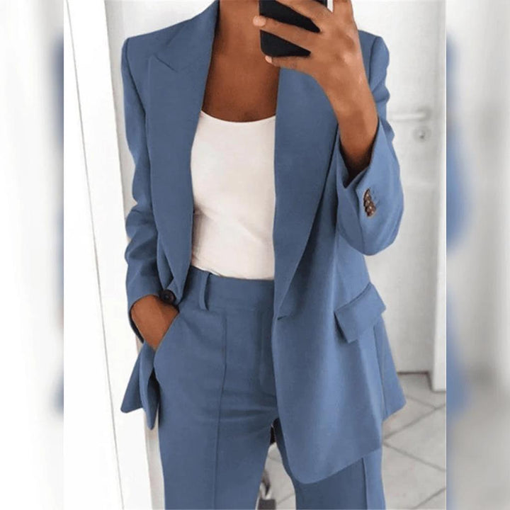 Women's classic blazer & tailored pants 2-piece suit set for professional business & formal occasions.