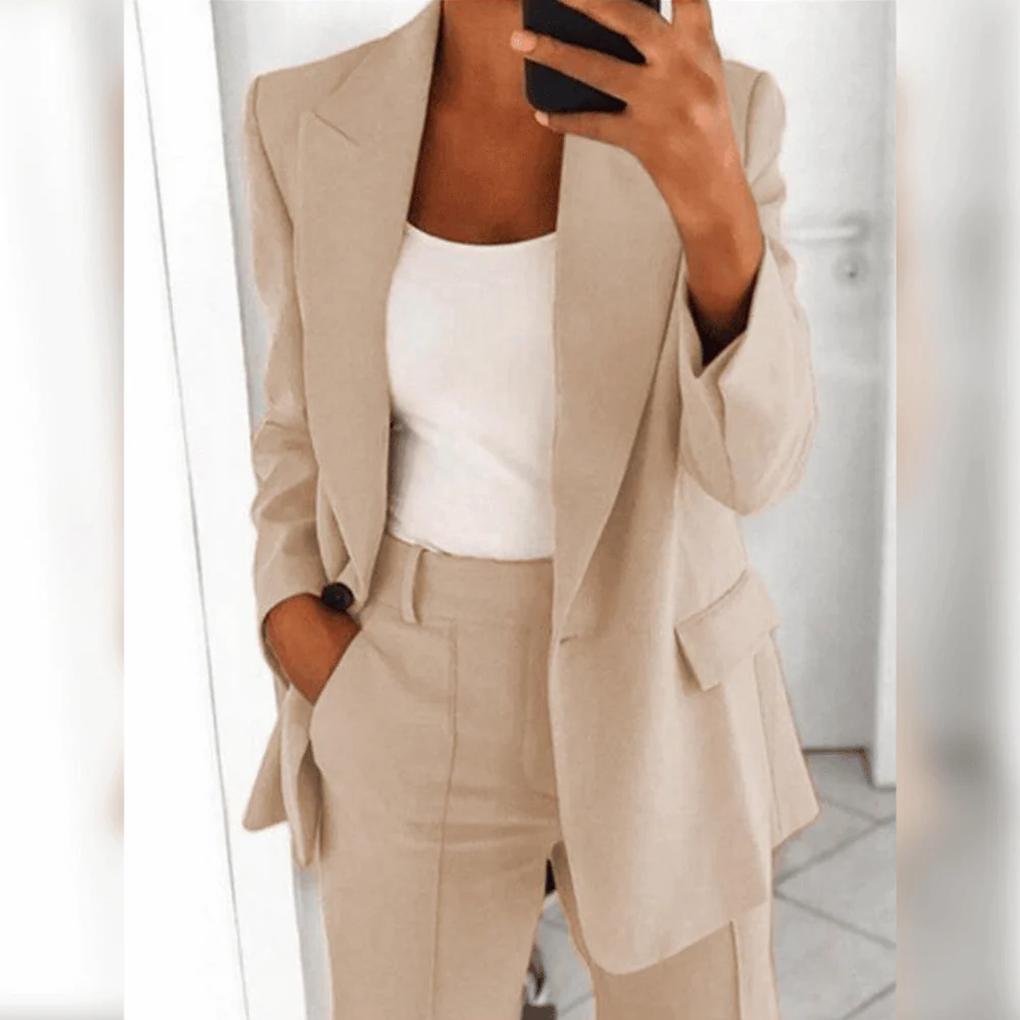 Sophisticated women's tailored 2-piece suit. Elegant blazer & pants for professional business attire.