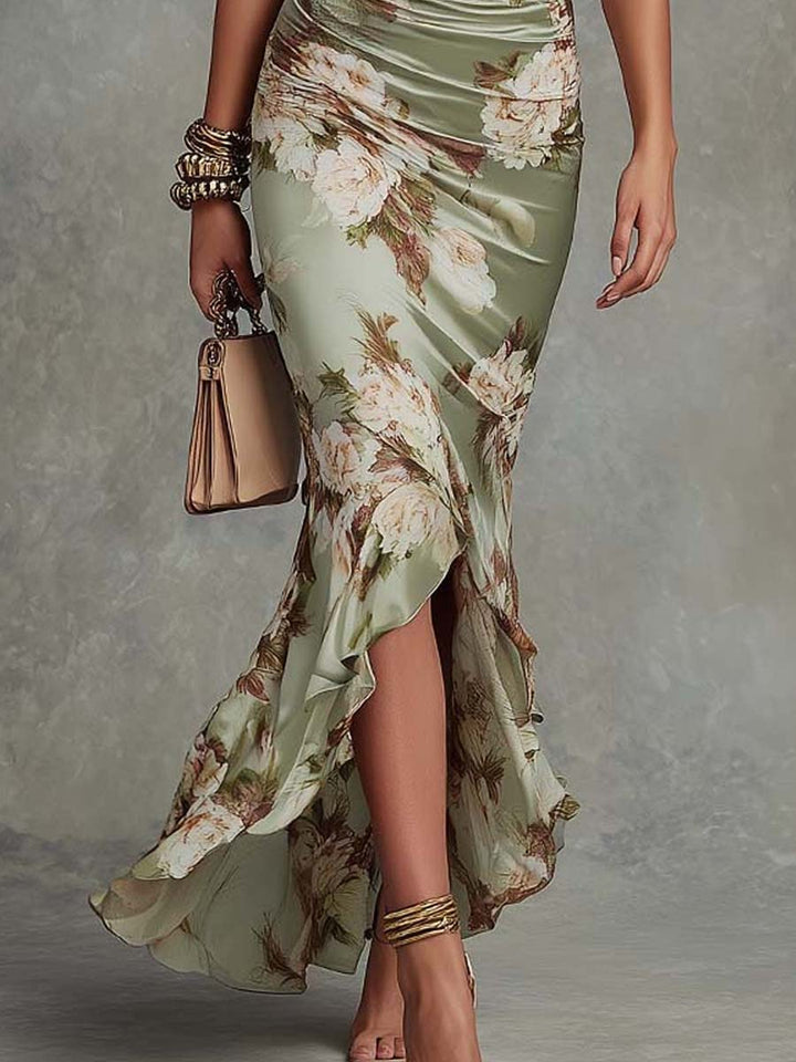 Sophisticated women's green asymmetrical maxi dress with a flowing design, great for wedding guests & formal events.