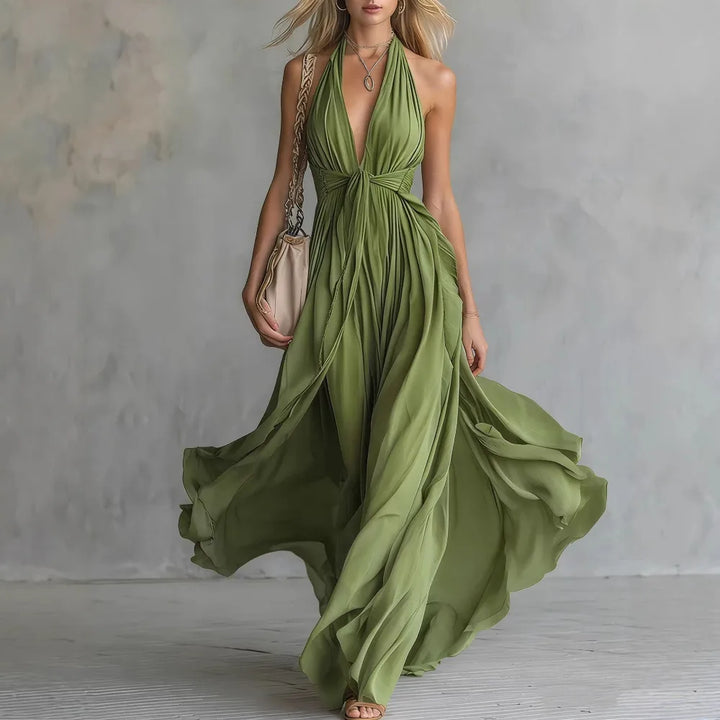 Show-stopping women's elegant backless halter gown. Perfect for parties, proms & special occasions.