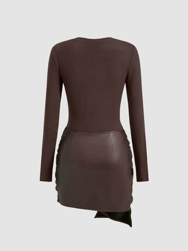 Fashionable women's knit midi dress, showcasing a flattering tie waist in contrasting faux leather.