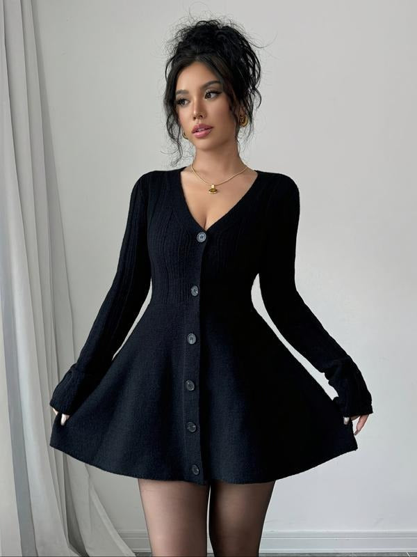 Casual yet chic V-neck knit mini dress for women, featuring a flattering flare skirt and long sleeves.