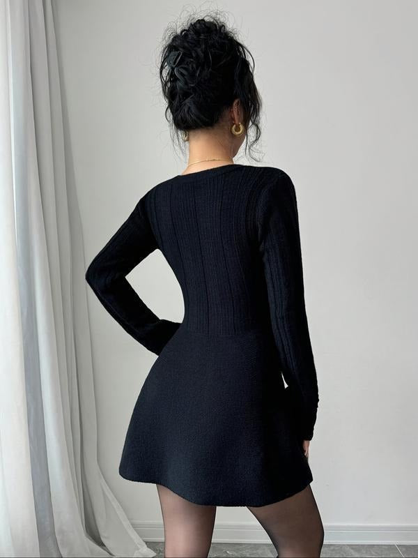 Fashionable women's knit mini dress with V-neck, long sleeves, and a playful flare skirt, perfect for casual elegance.