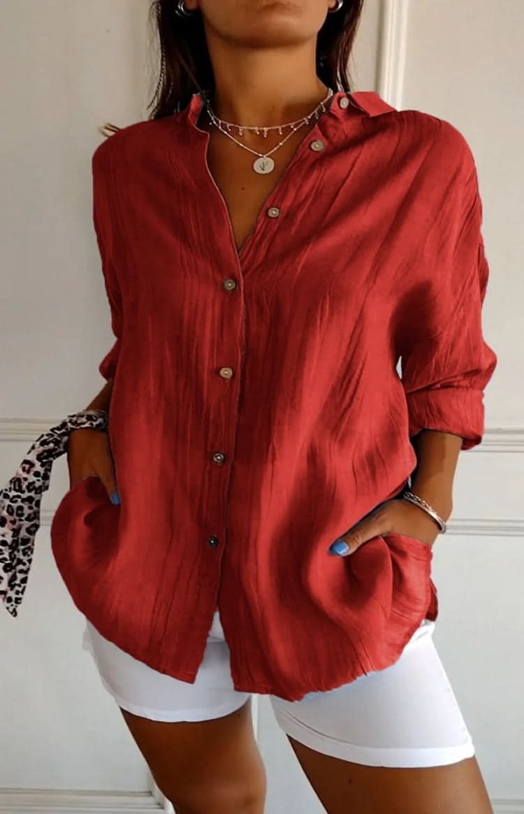 Soft fabric women's elegant blouse, a chic long sleeve top offering versatile style for office or casual.