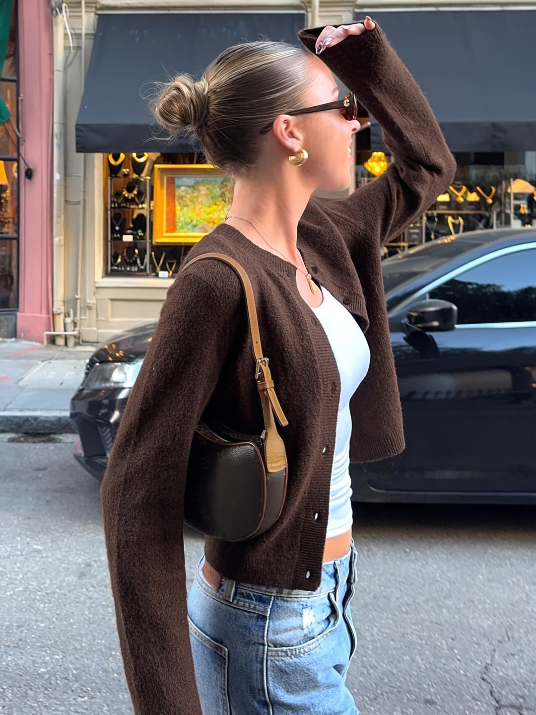 Elegant women's cropped knit cardigan in an alpaca blend, with long sleeves and a button front closure