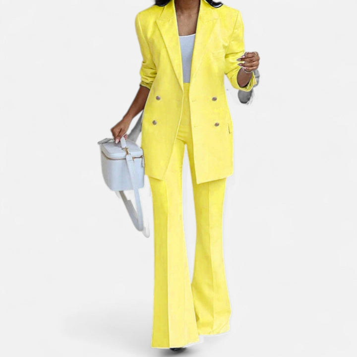 Professional women's two-piece suit set featuring a classic double-breasted blazer and dress pants.