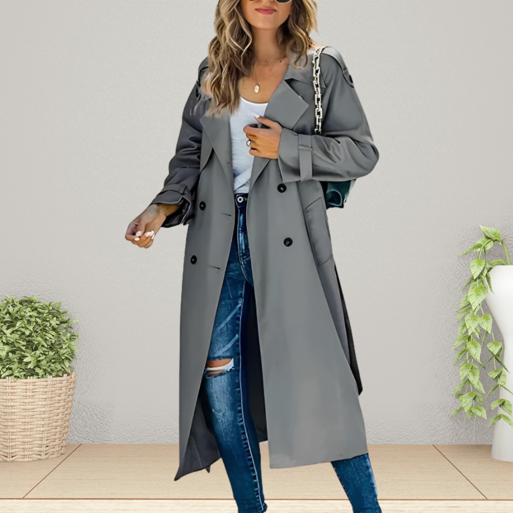Fashionable women's double-breasted trench coat, an elegant transitional jacket for spring and fall style.