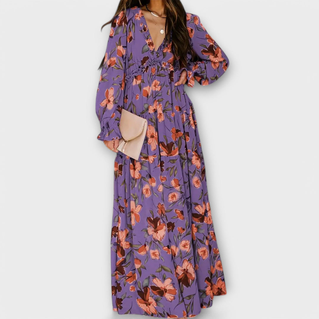 Vibrant floral women's maxi dress with elegant pleats, a must-have long summer dress for any occasion.