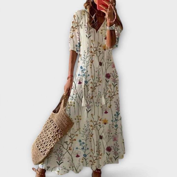Chic women's flowy maxi dress; an elegant, comfortable, and versatile choice for summer fashion.