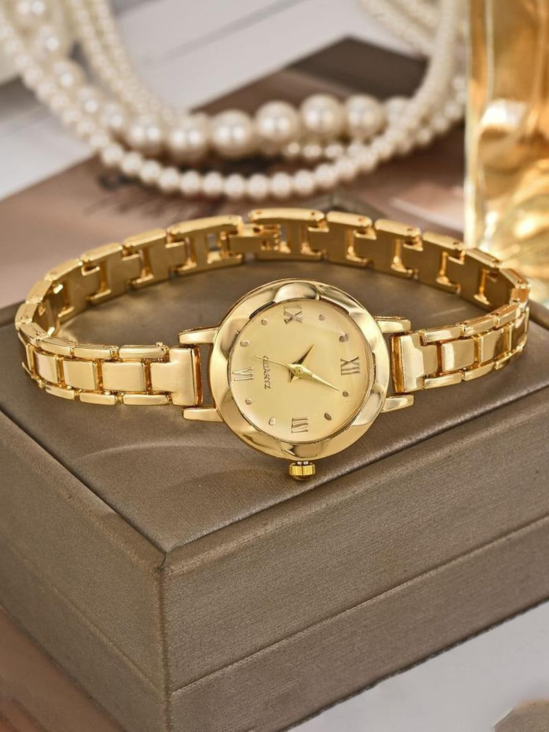 Elegant women's gold bracelet watch with a classic black dial, perfect for a sophisticated look.