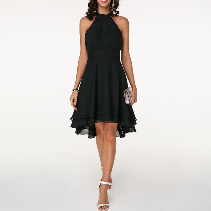 Stunning blue women's sleeveless mini dress with elegant halter neckline & flowing fluid drape.