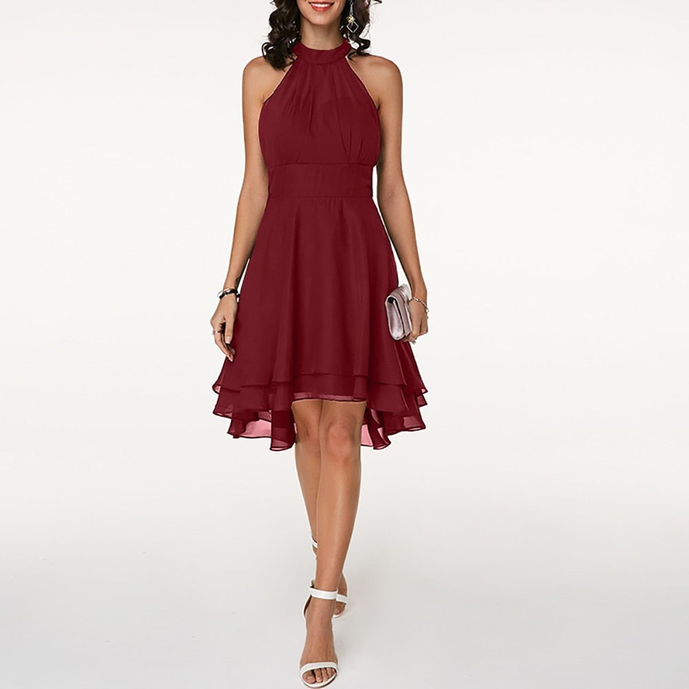 Vibrant red women's halter mini dress with elegant fluid drape, ideal for special occasion parties.