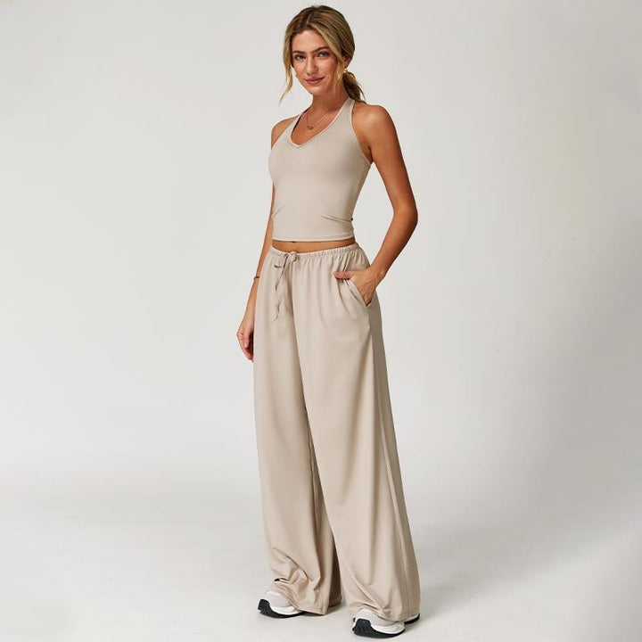 Comfortable women's lounge set with a flattering halter top and flowy wide-leg pants, ideal for relaxation