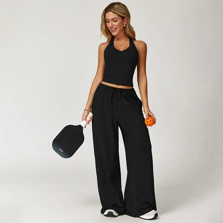 Leisure wear matching set for women, including an elegant halter top and wide-leg trousers in a soft fabric