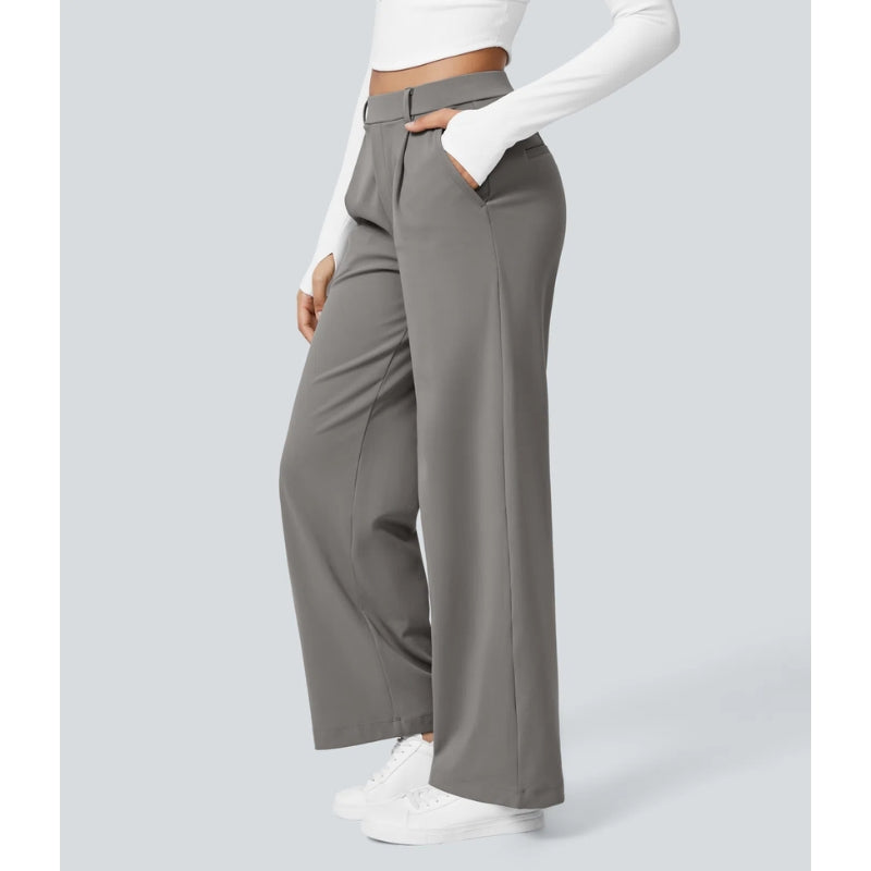 Flowy women's tailored trousers, high waisted and wide leg, ideal for a sophisticated business look.