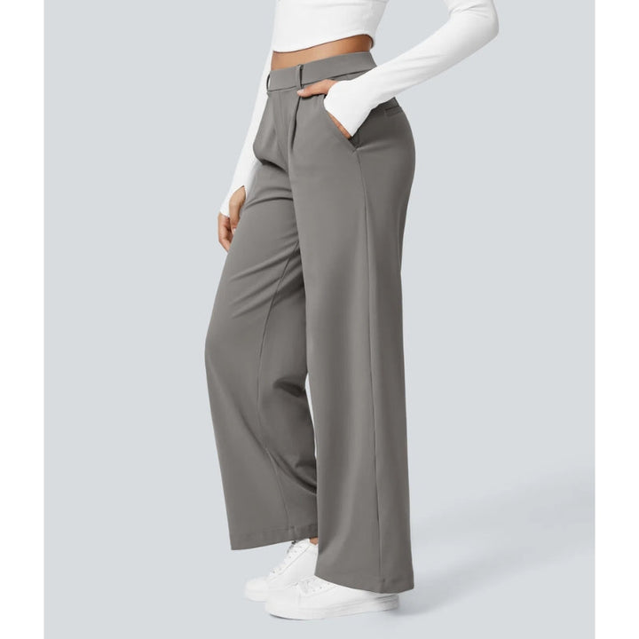 Flowy women's tailored trousers, high waisted and wide leg, ideal for a sophisticated business look.
