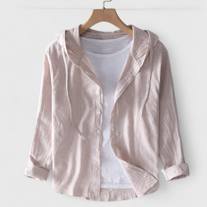 Chic women's hooded blouse, a comfortable layering piece. Elegant everyday wear with a relaxed fit.