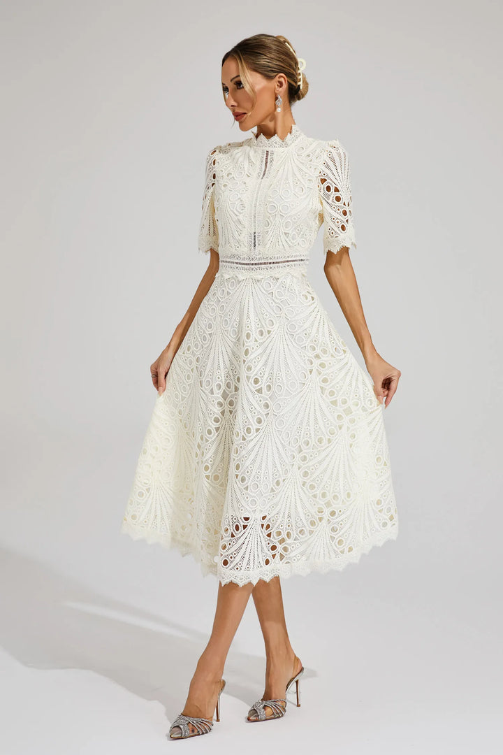 Elegant women's lace midi dress, perfect for a wedding guest or special occasion.