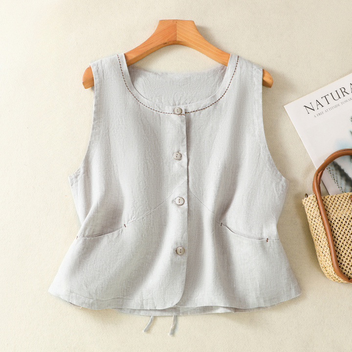 Elegant women's linen vest in a neutral color, perfect for summer layering and casual chic outfits.