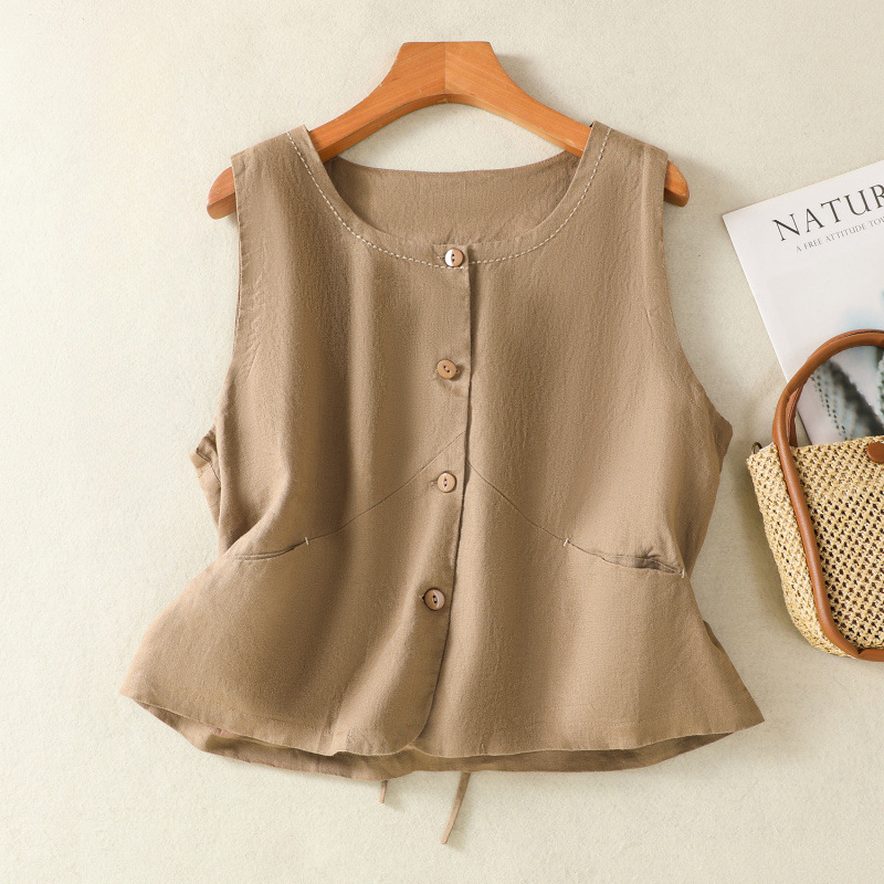 Full shot of a model wearing a women's elegant linen vest, styled for a sophisticated summer look.