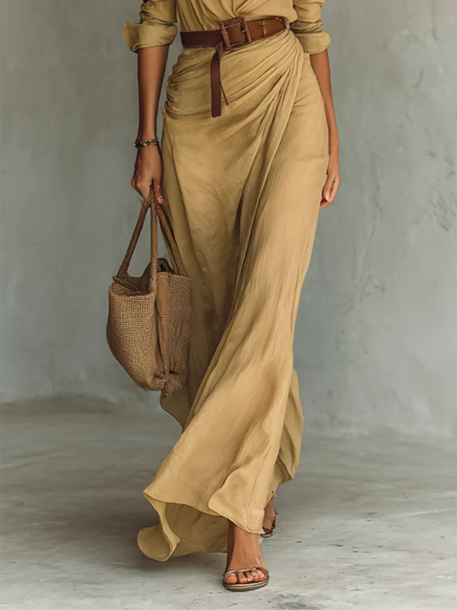 Sophisticated women's apparel: long sleeve belted maxi dress featuring a chic wrap style V-neck.