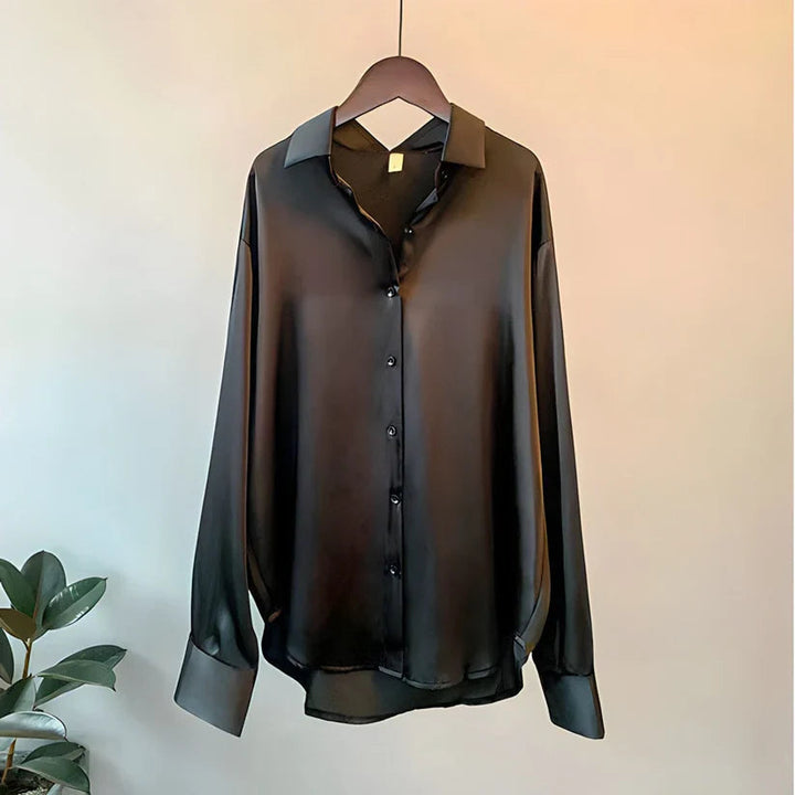 Comfortable long sleeve loose fit women's blouse. Elegant office wear or casual chic fashion top for women.