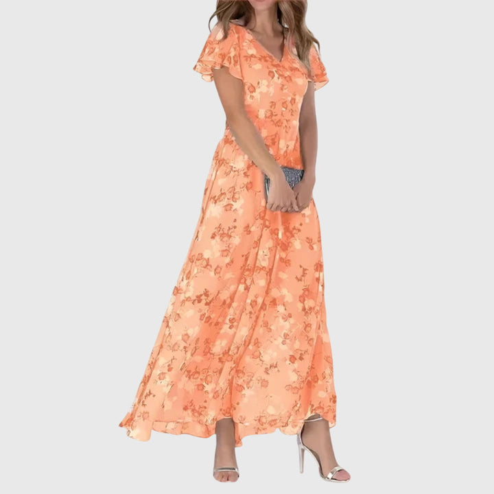Elegant women's maxi dress with flutter sleeves, V-neck, and A-line skirt, perfect for evening events.
