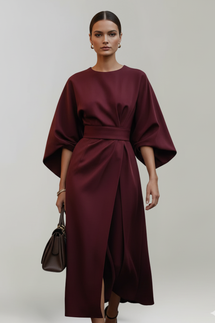 Sophisticated women's casual midi dress, featuring a flattering belted waist and elegant wide sleeves.