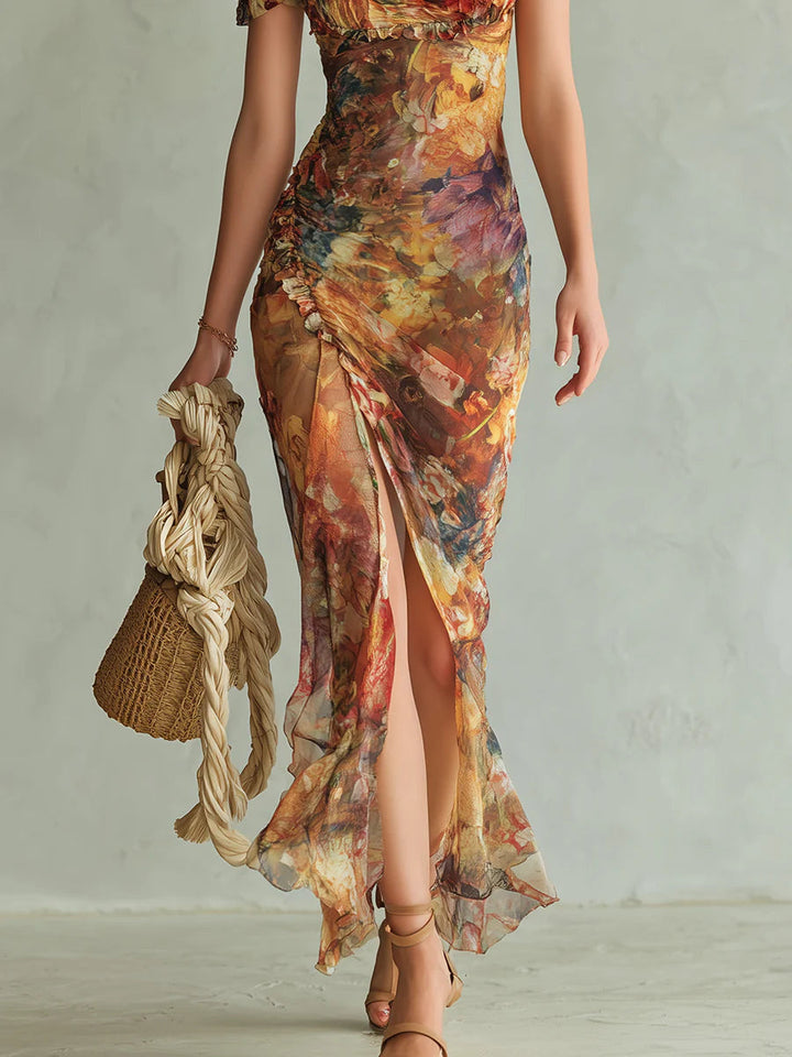 Women's charming orange floral maxi dress, sweetheart neck, ruched details, and puff sleeves for special occasions.