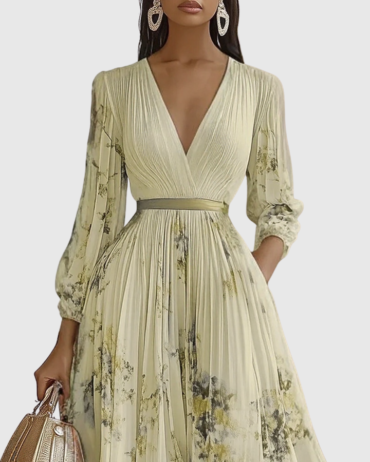 Women's V-neck maxi dress, long sleeve & pleated, featuring a lovely floral print. Versatile for elegant occasions.