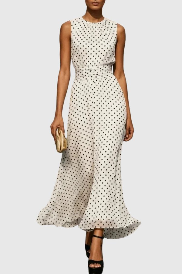 Elegant women's polka dot maxi dress with ruffle hem, perfect for evening occasions & formal events.