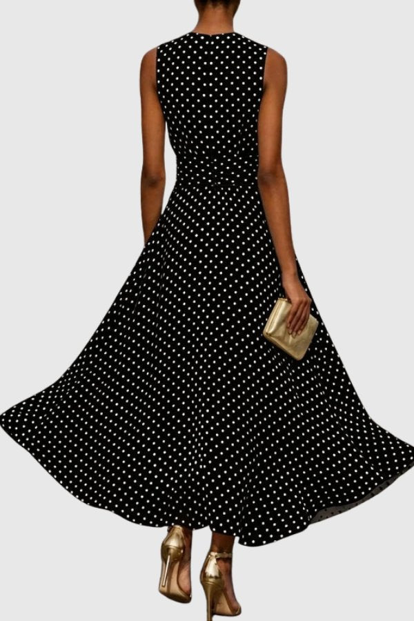 Formal polka dot evening gown with a flattering ruffle hem, a chic choice for any special occasion.