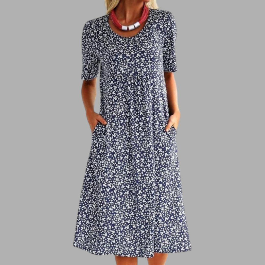 Elegant women's printed midi dress, ideal for spring/summer. Flattering regular fit, chic style.