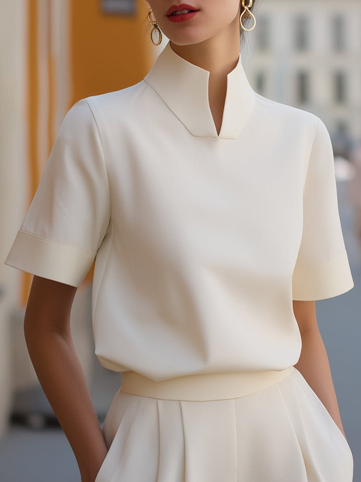 Elegant women's short sleeve mandarin collar blouse, relaxed fit, perfect for office or dressy casual.