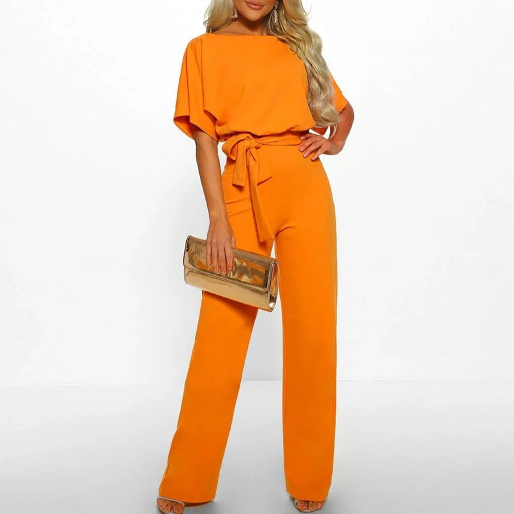 Classic women's solid color jumpsuit for timeless elegance and versatile styling options.