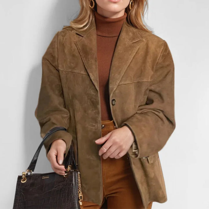 Fashionable long sleeve women's suede blazer, versatile outerwear for an elegant, polished look.