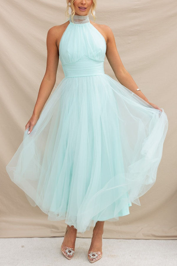 Delightful women's elegant tulle midi dress, exquisite choice for wedding guest, party, or celebration.