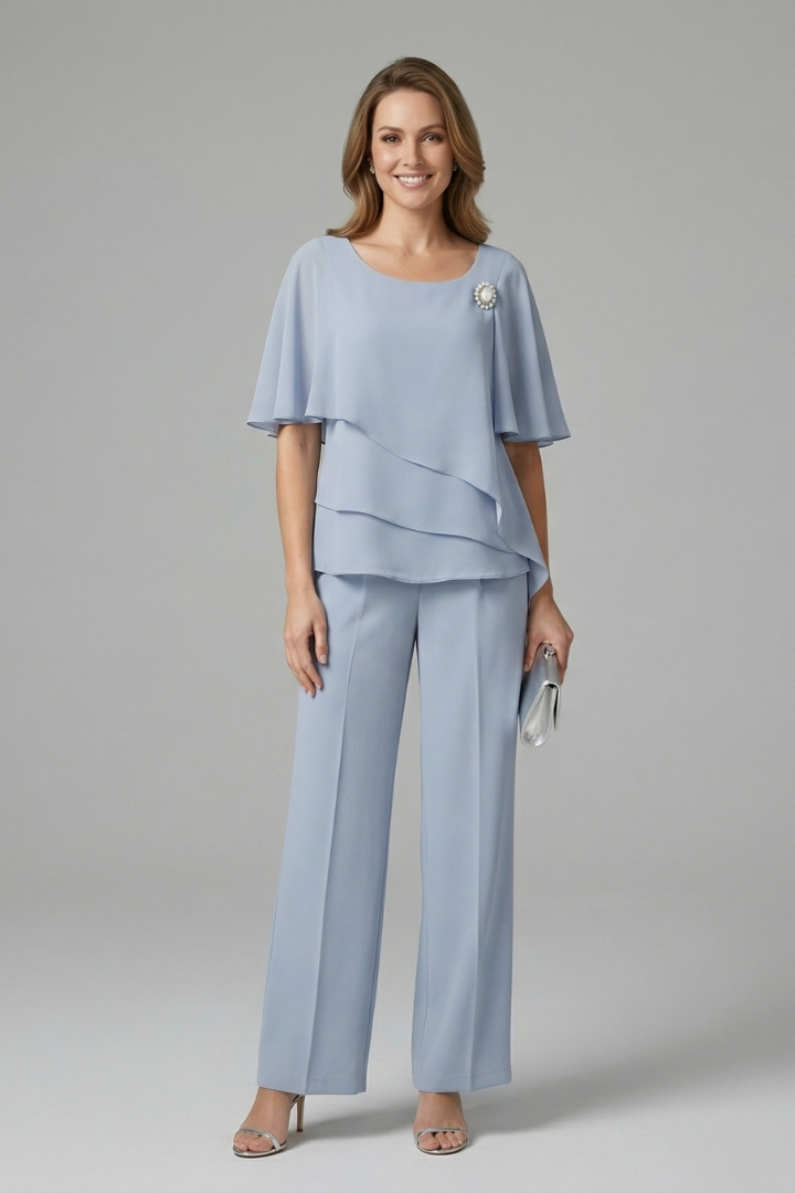 Chic women's layered top and straight leg trousers matching set for a modern, versatile summer fashion look.