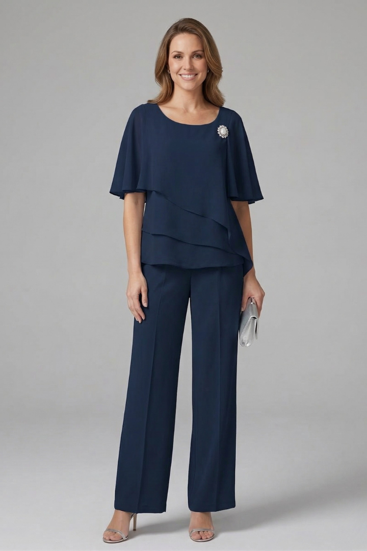 Modern women's matching set: elegant layered top and comfortable straight leg trousers. Perfect for summer fashion.