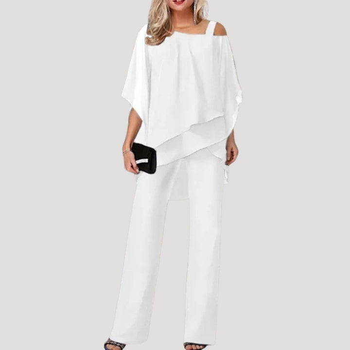 Women's elegant two-piece wide-leg trouser set with a chic asymmetric top, perfect for formal parties.