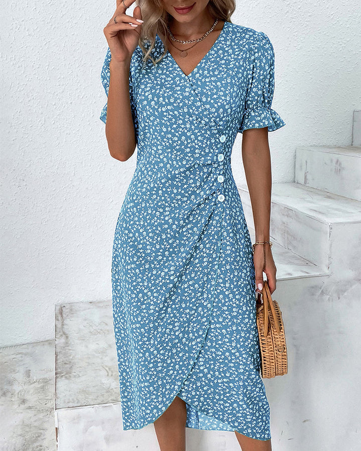 Chic floral midi wrap dress for women, featuring a flattering V-neck and elegant puff sleeves.