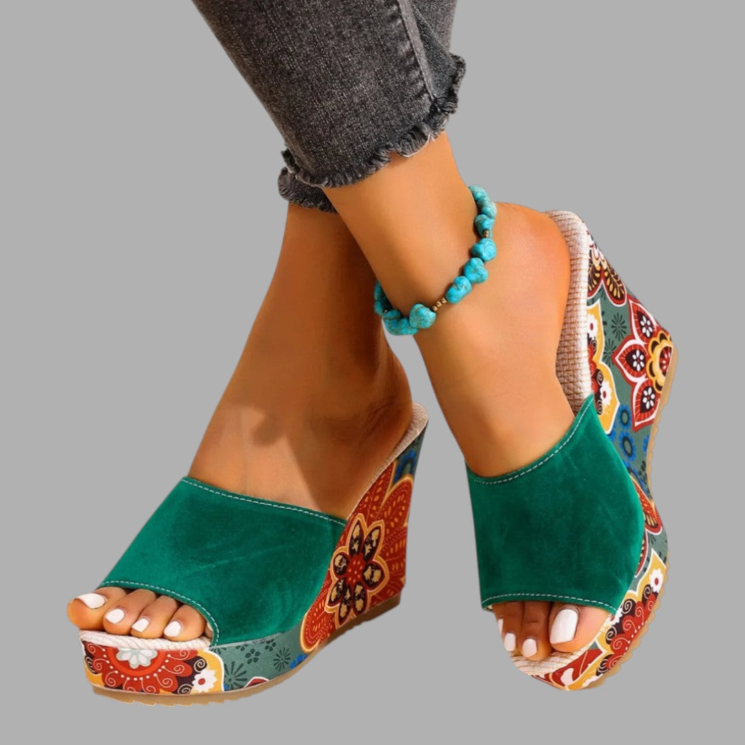 Elegant women's wedge sandals, perfect for summer occasions. Comfortable and stylish heeled footwear.