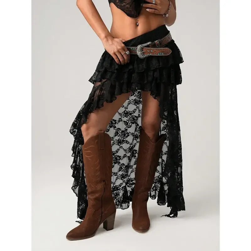 Close-up of the delicate lace and tiered ruffles on a women's high-low midi skirt, bohemian style